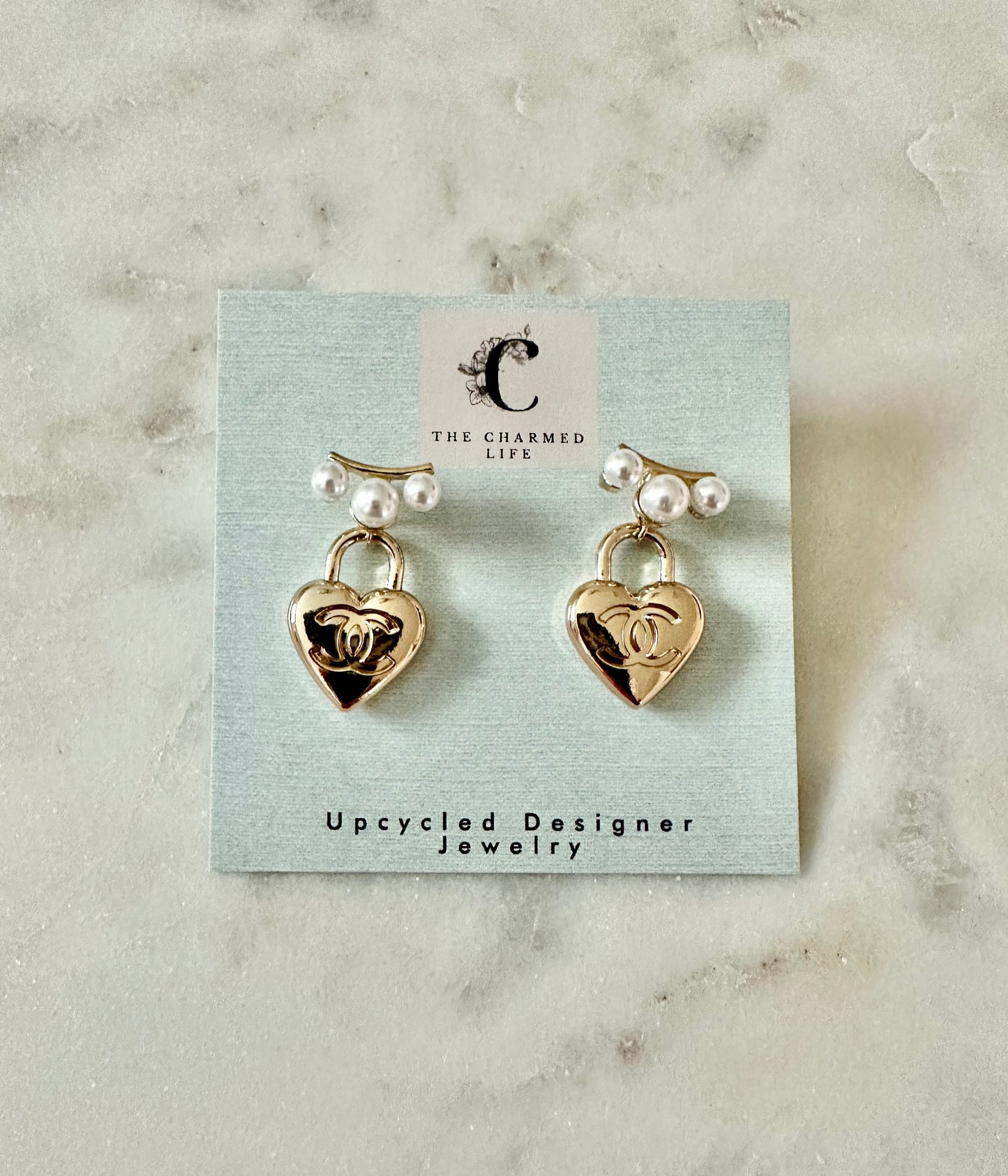 CC heart faux pearl earrings