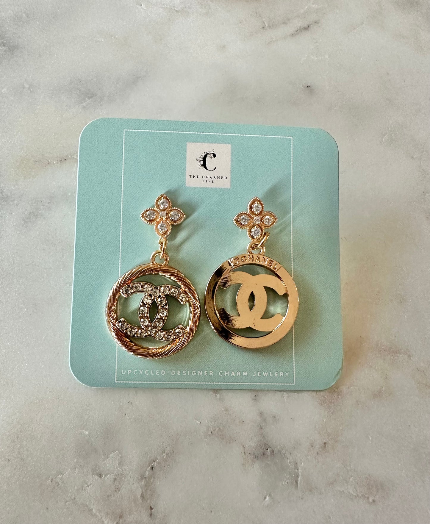 CC gold and fleur earrings