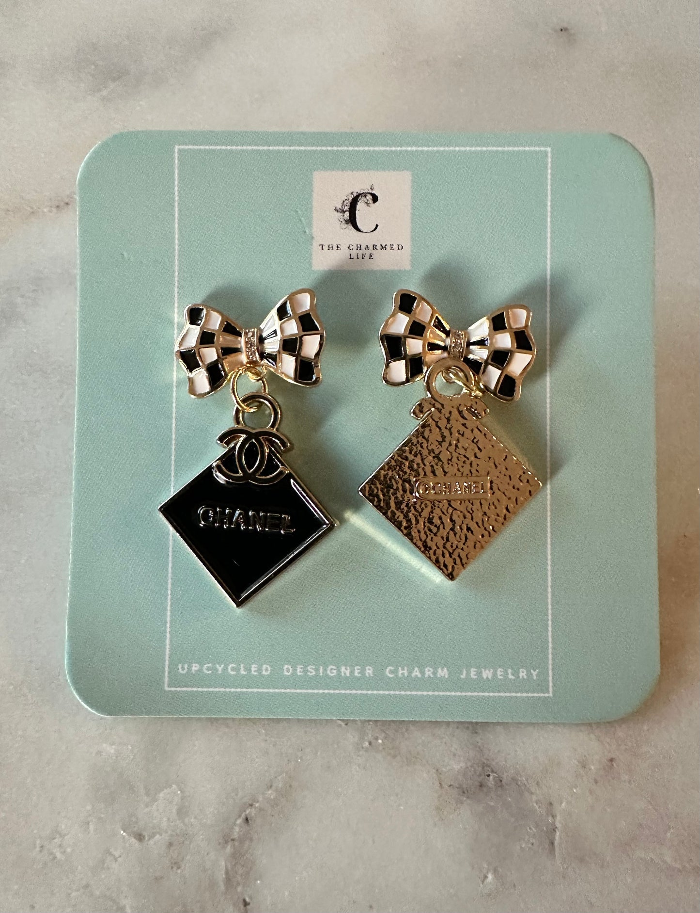 Chanel black square with black and white bow earrings