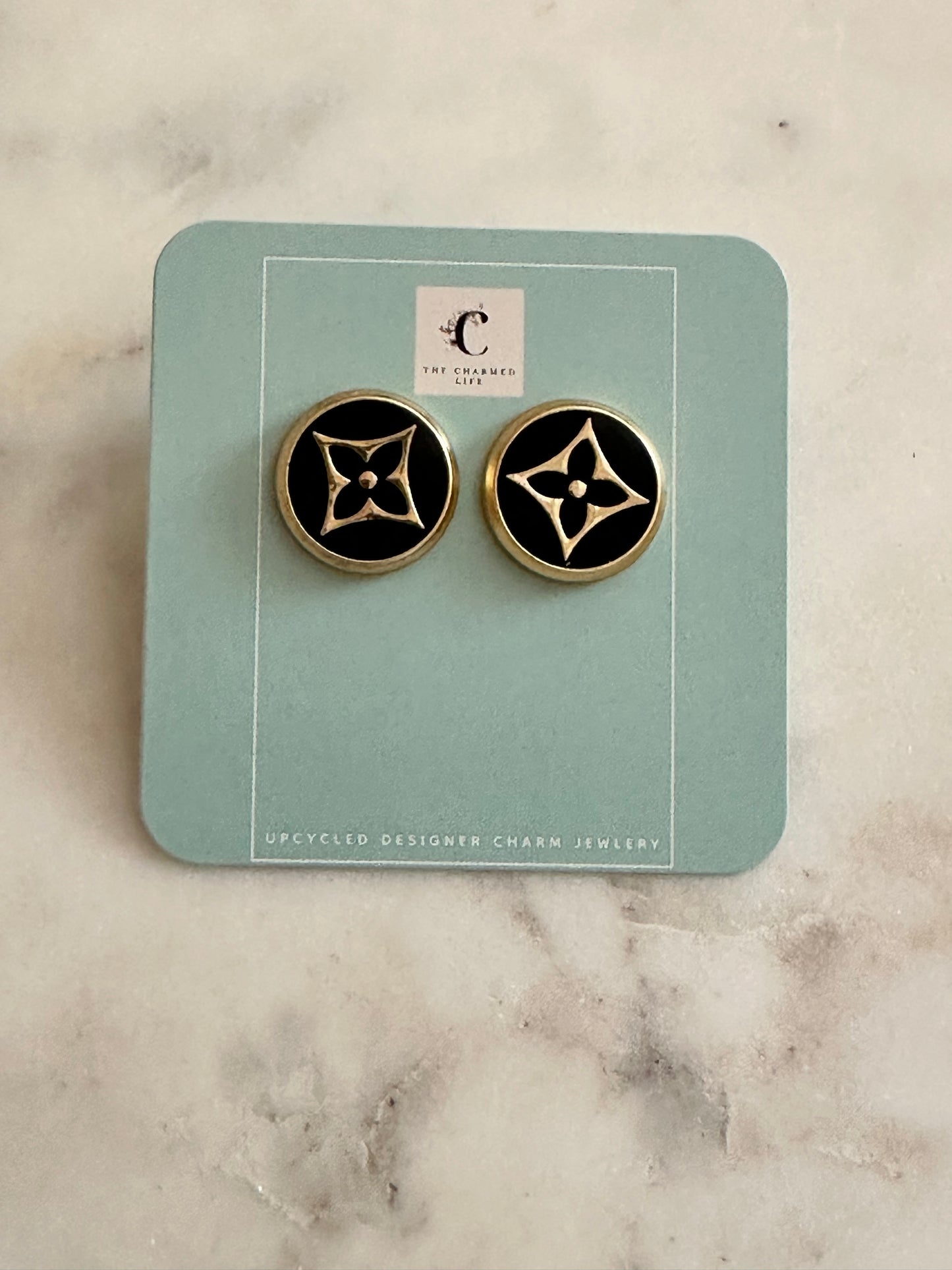 LV button earrings
