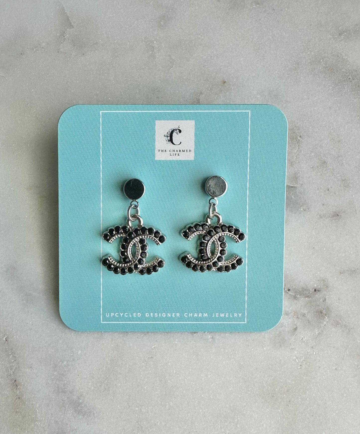 CC silver and black rhinestone earrings