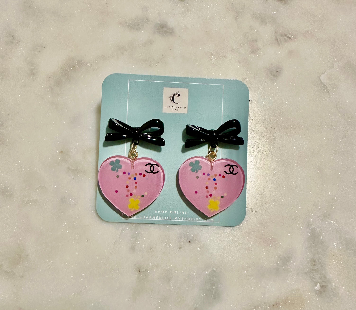 CC pink resin earrings
