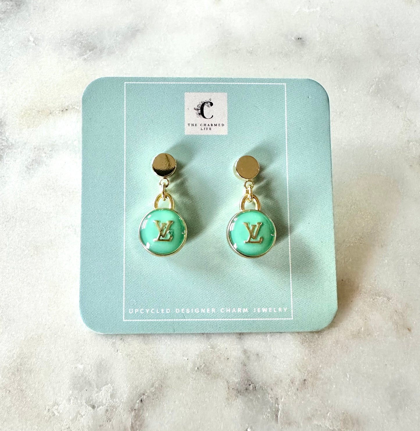 LV teal green earrings