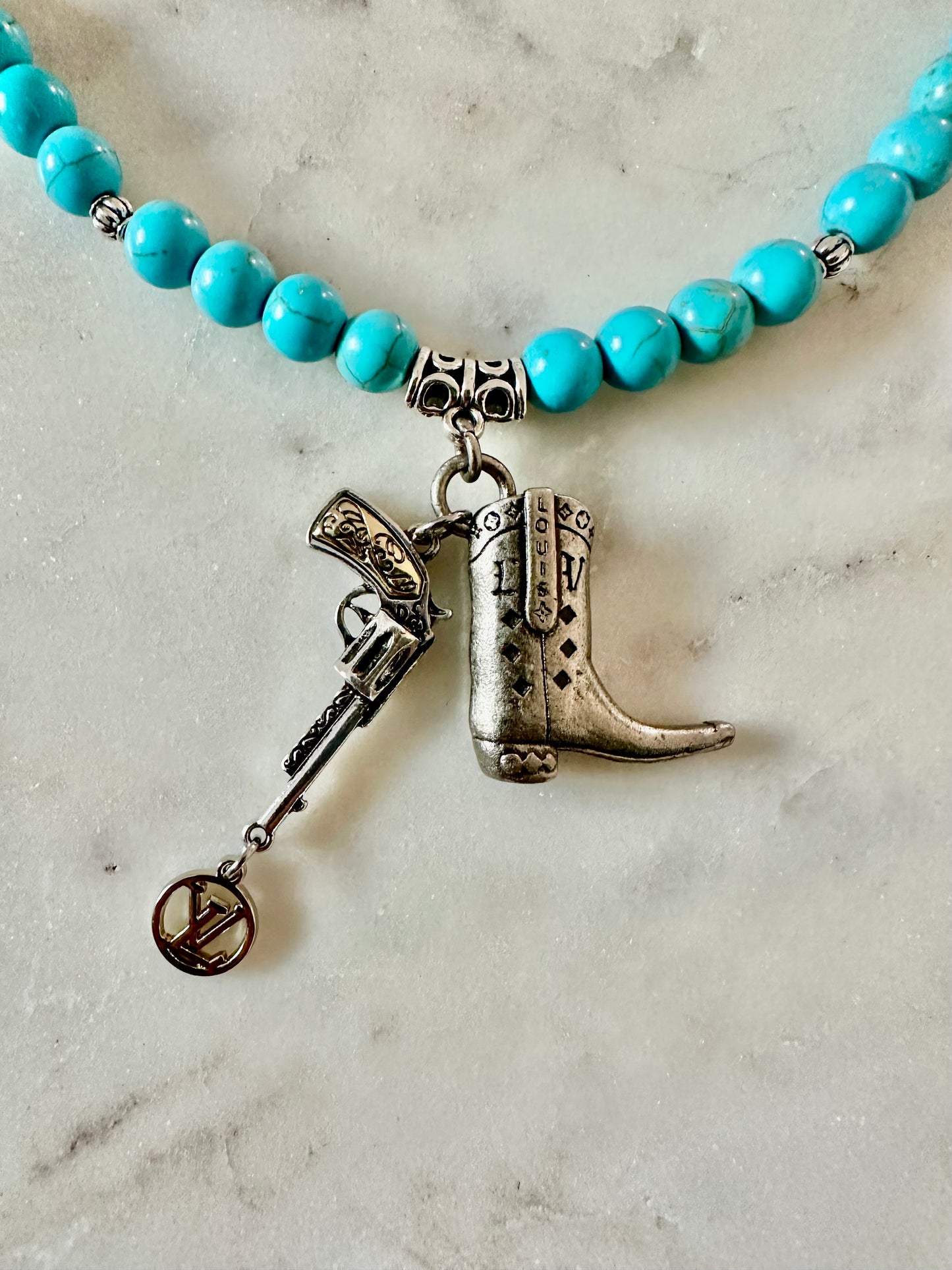 LV boots and gun beaded necklace silver tone