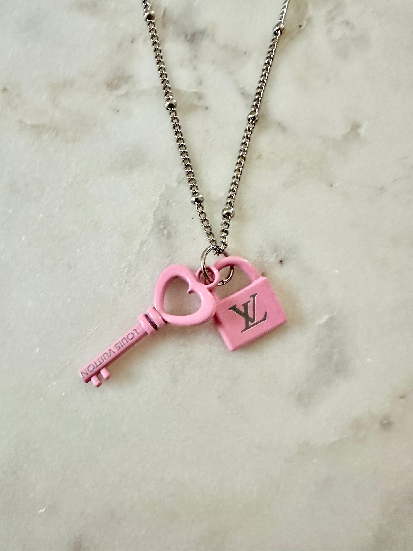 LV pink lock and key necklace