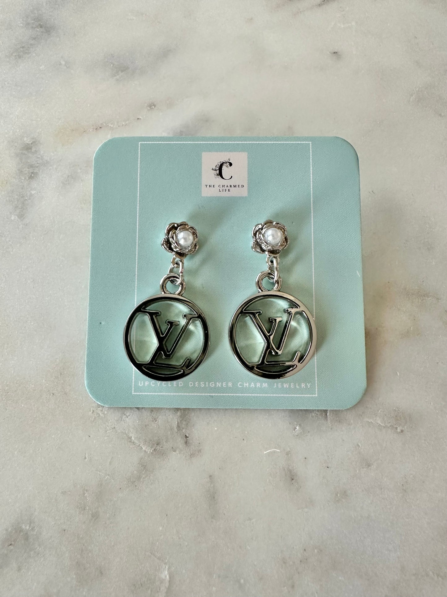 LV circle silver tone with faux pearl flower post