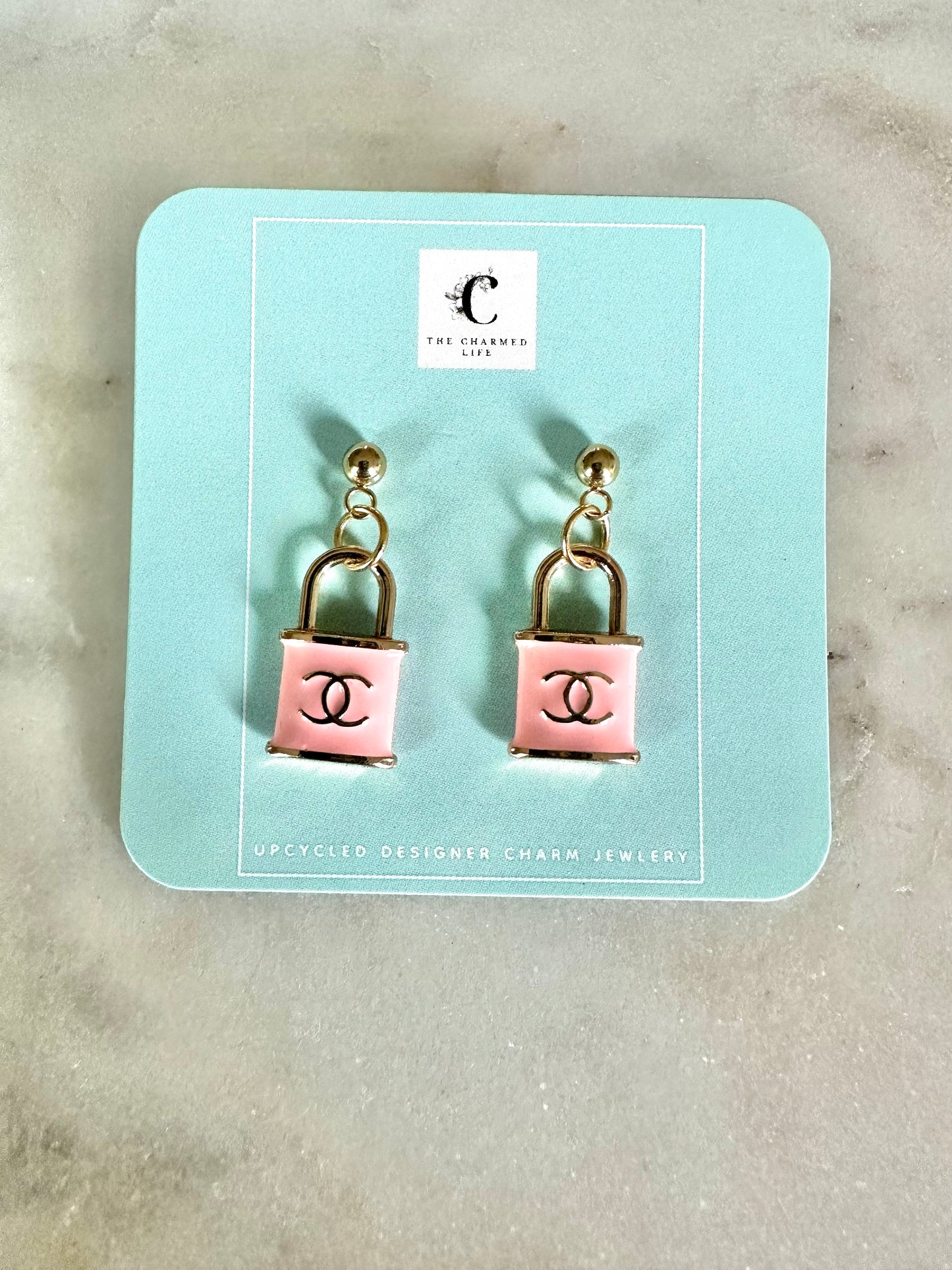 CC pink lock pendant earrings