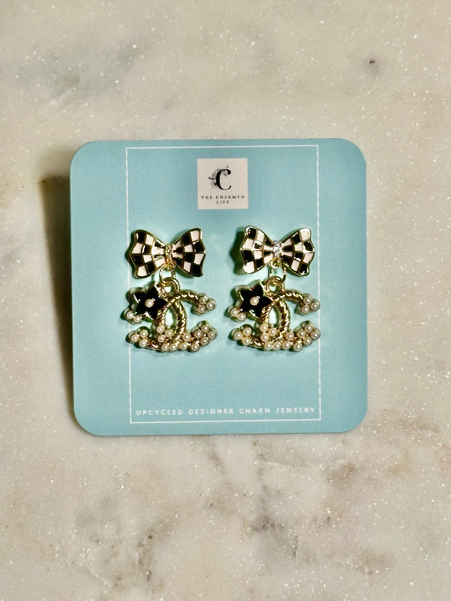 CC black and white pearl earrings