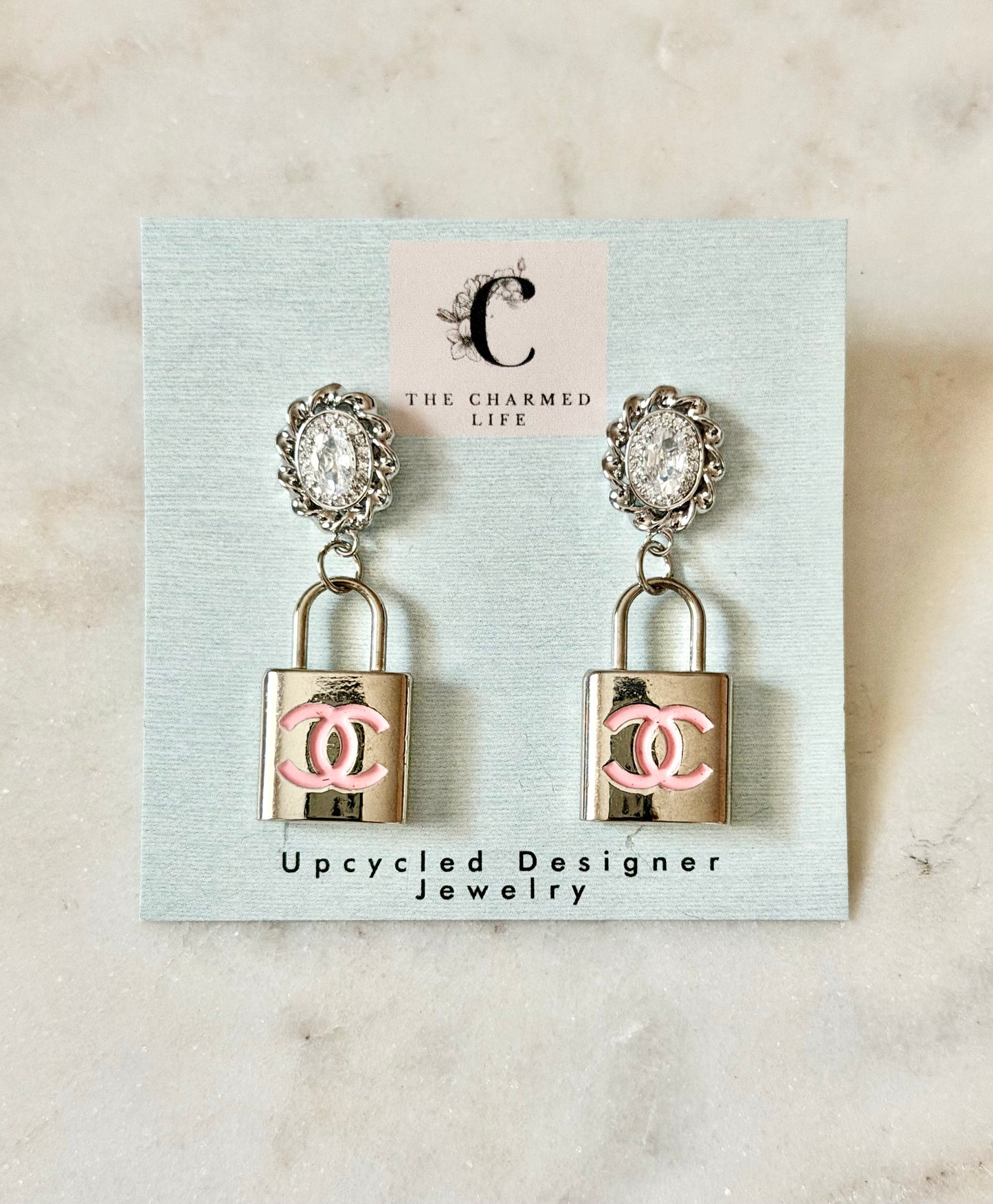 CC Pink lock rhinestone earrings