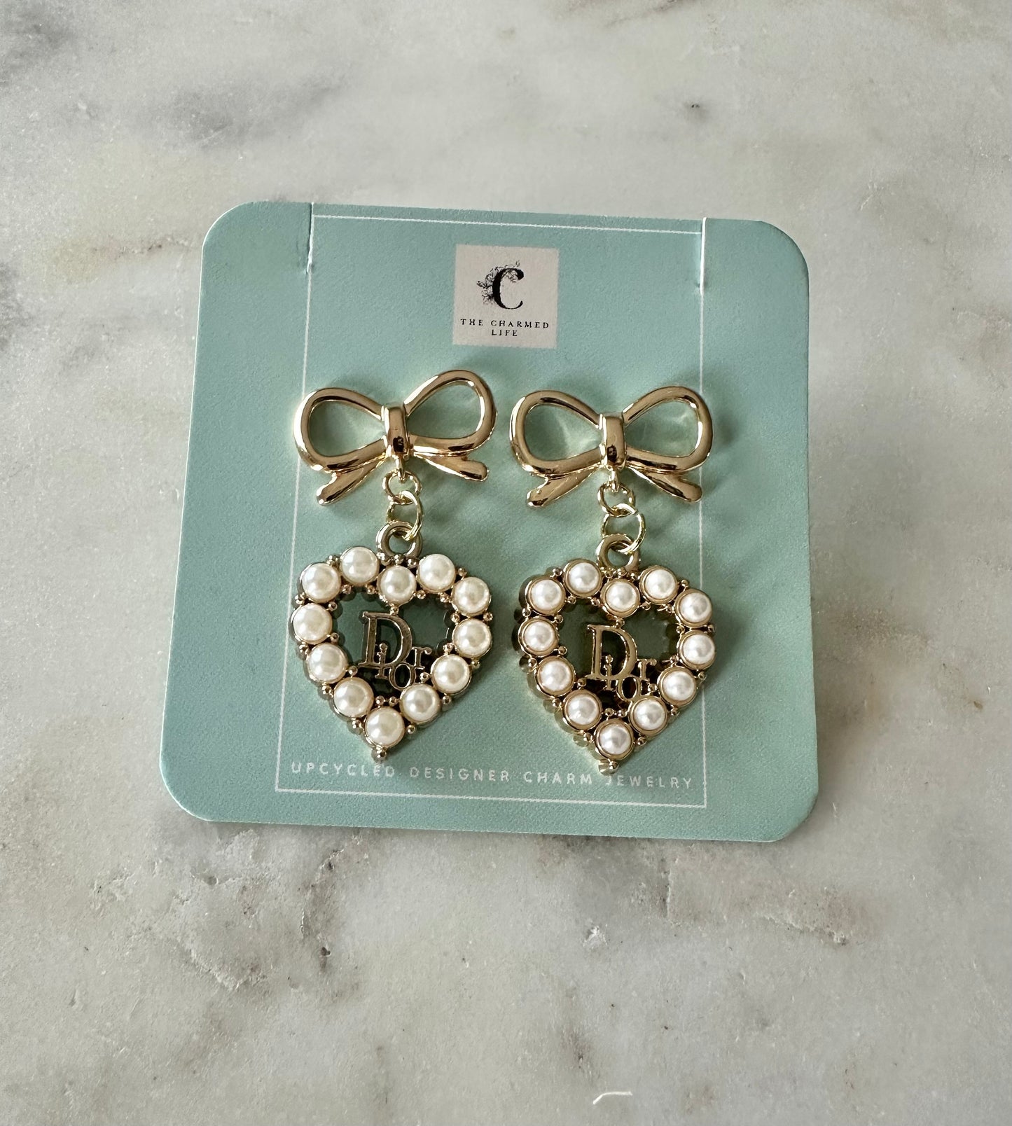 Dior heart faux pearl bow pendant earrings