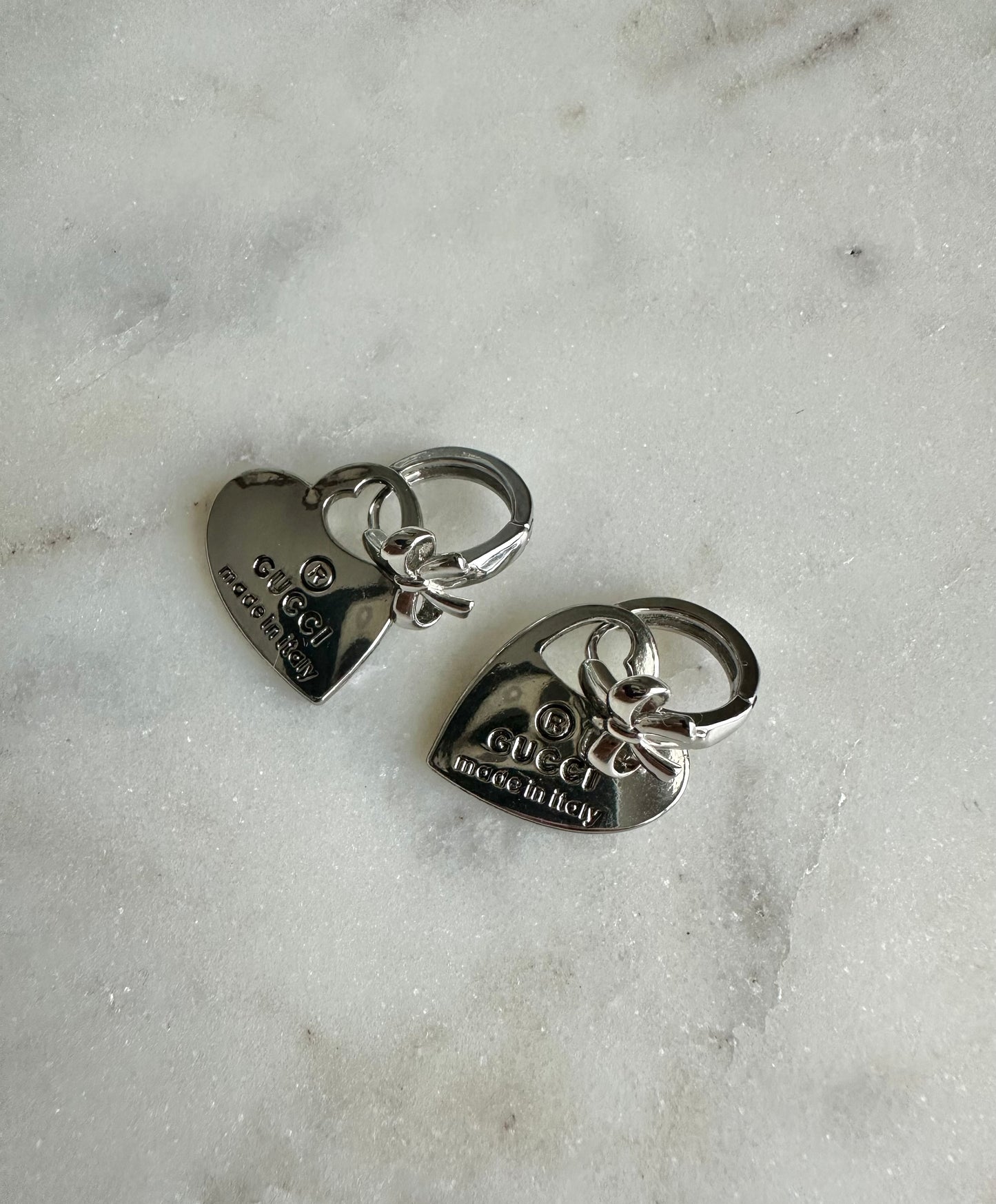 Gucci double sided heart earrings