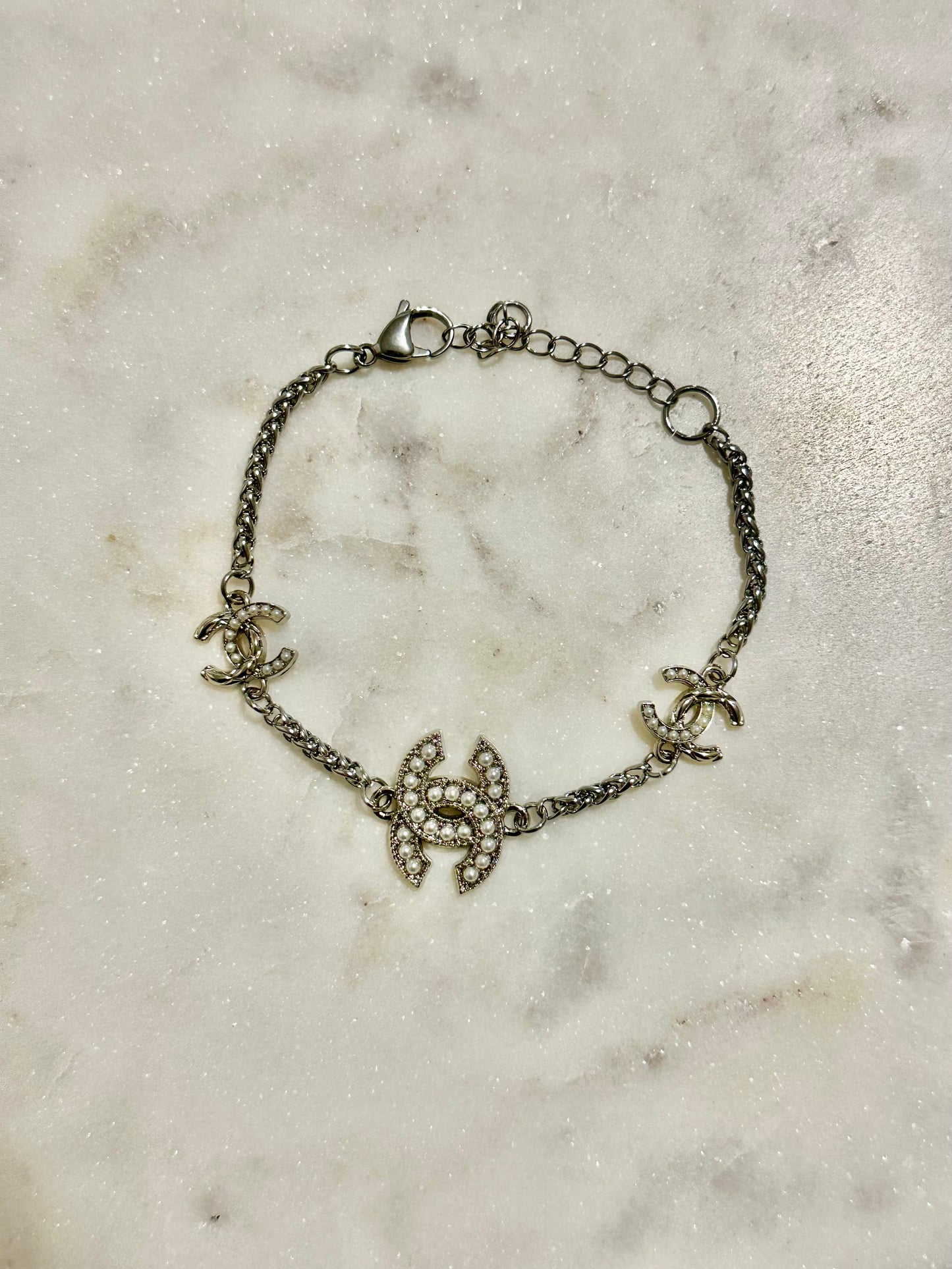 CC faux pearl bracelet