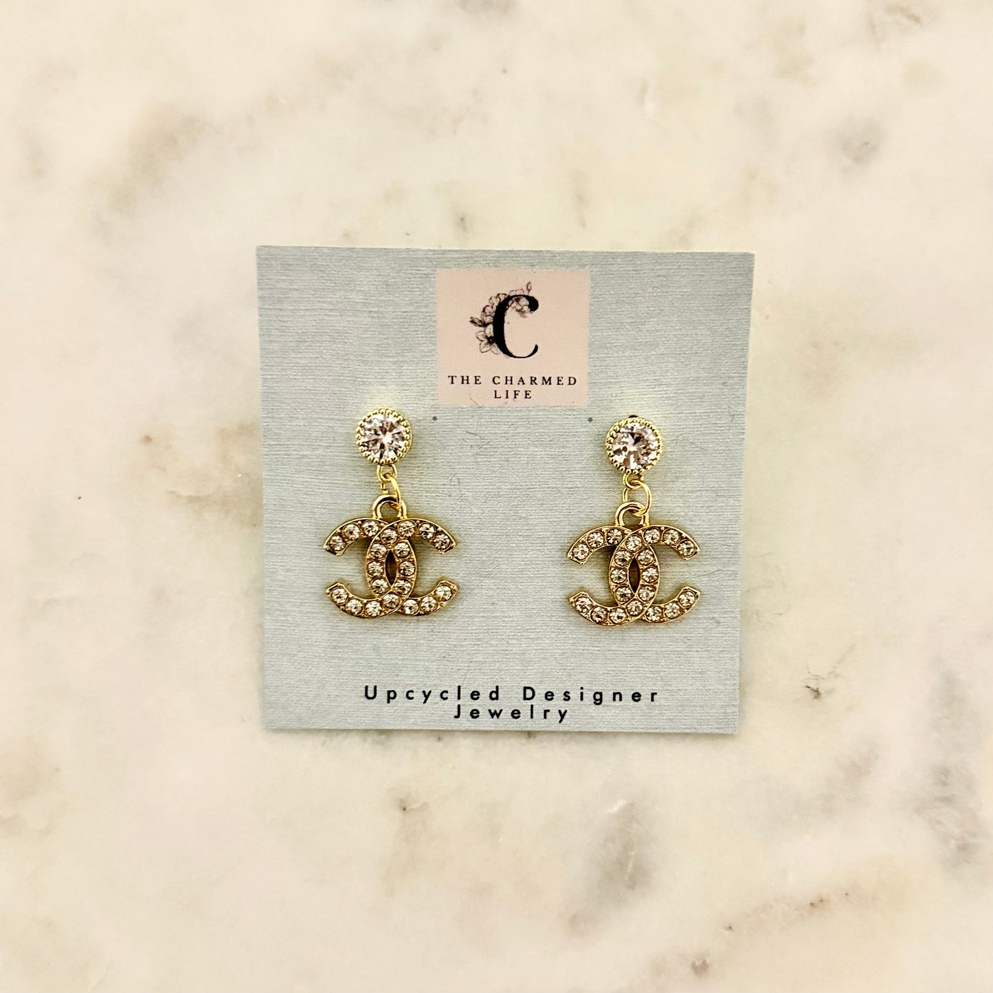 CC rhinestone earrings