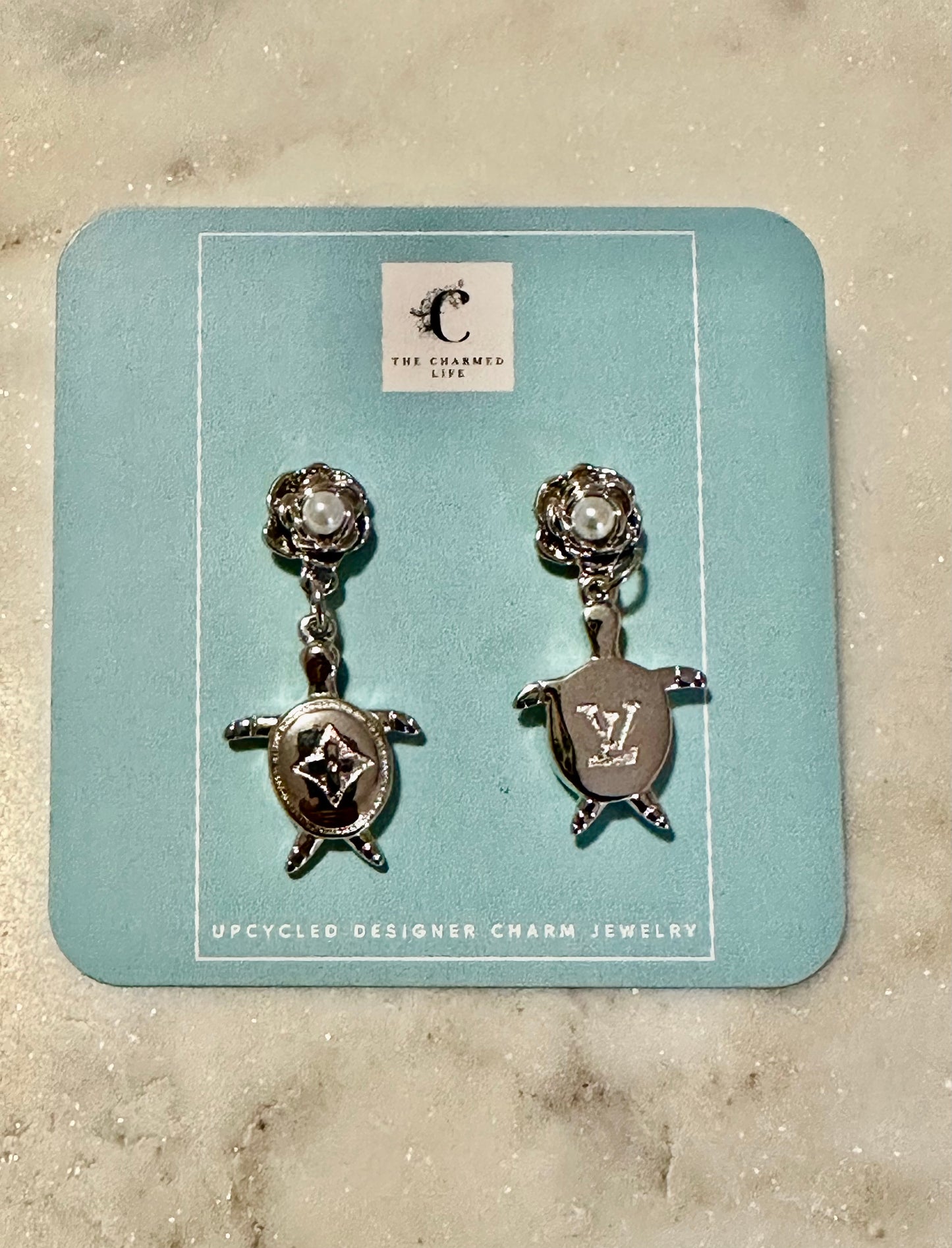 LV turtle earrings