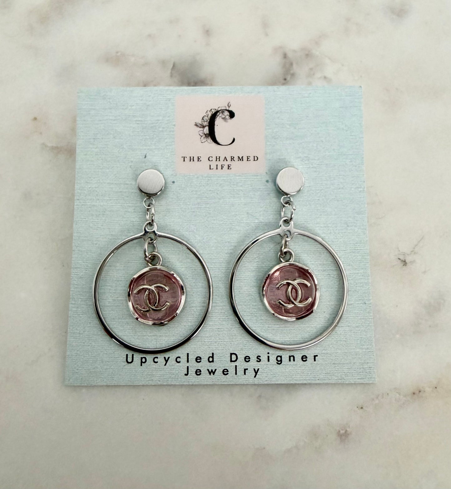 CC silvertone pink halo earrings