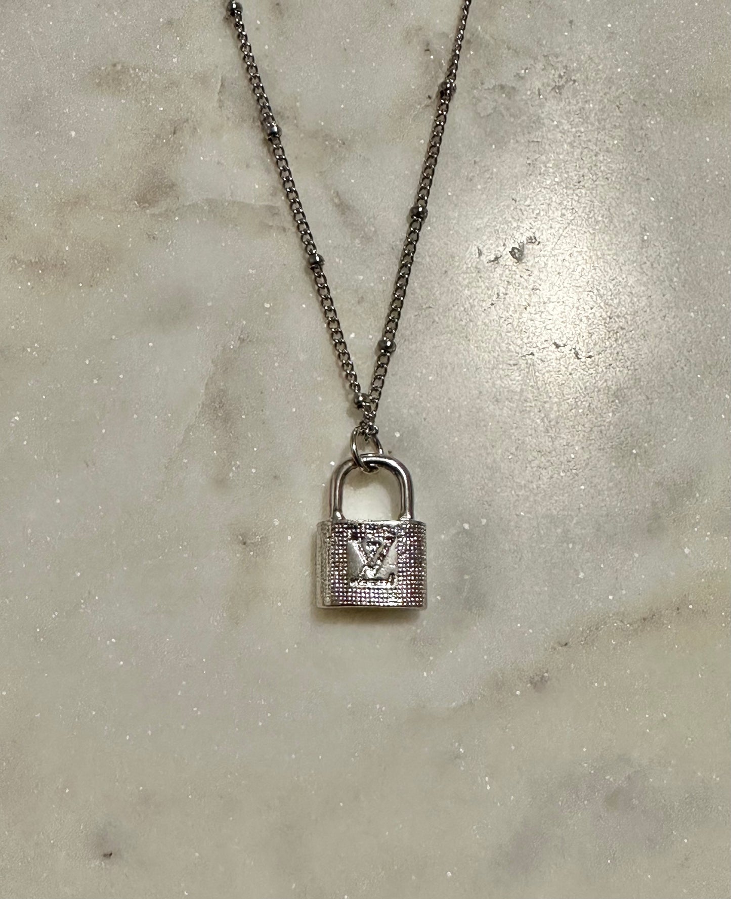 LV rhinestone lock necklace