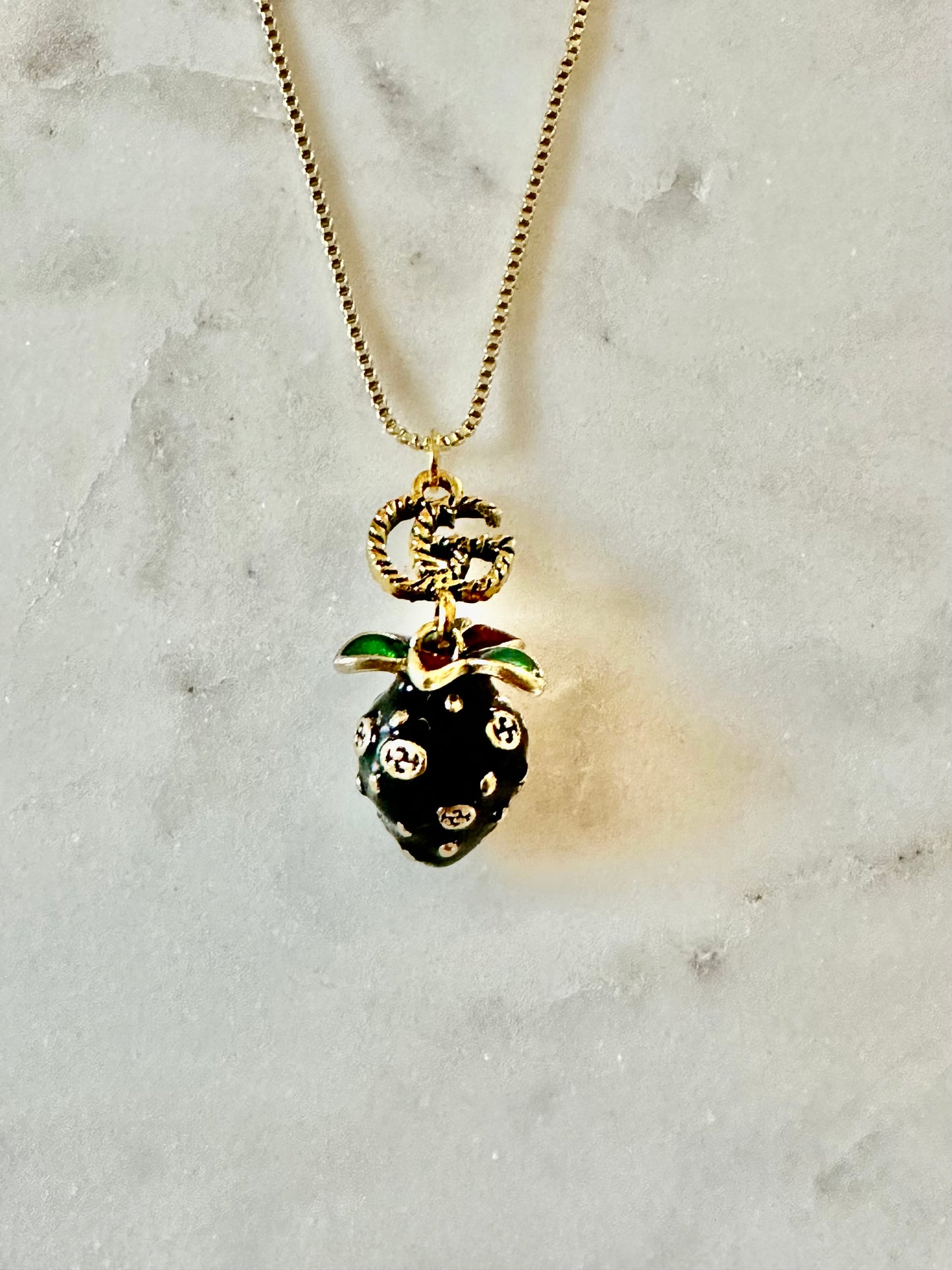 Gucci black strawberry necklace