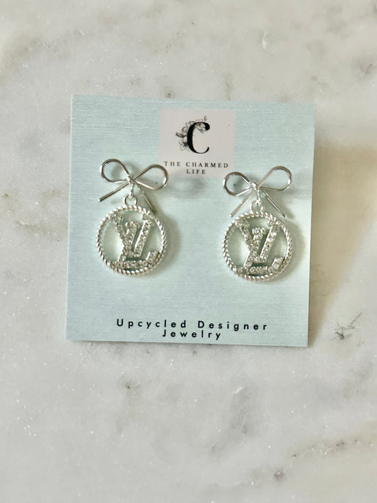 LV circle rhinestone bow earrings