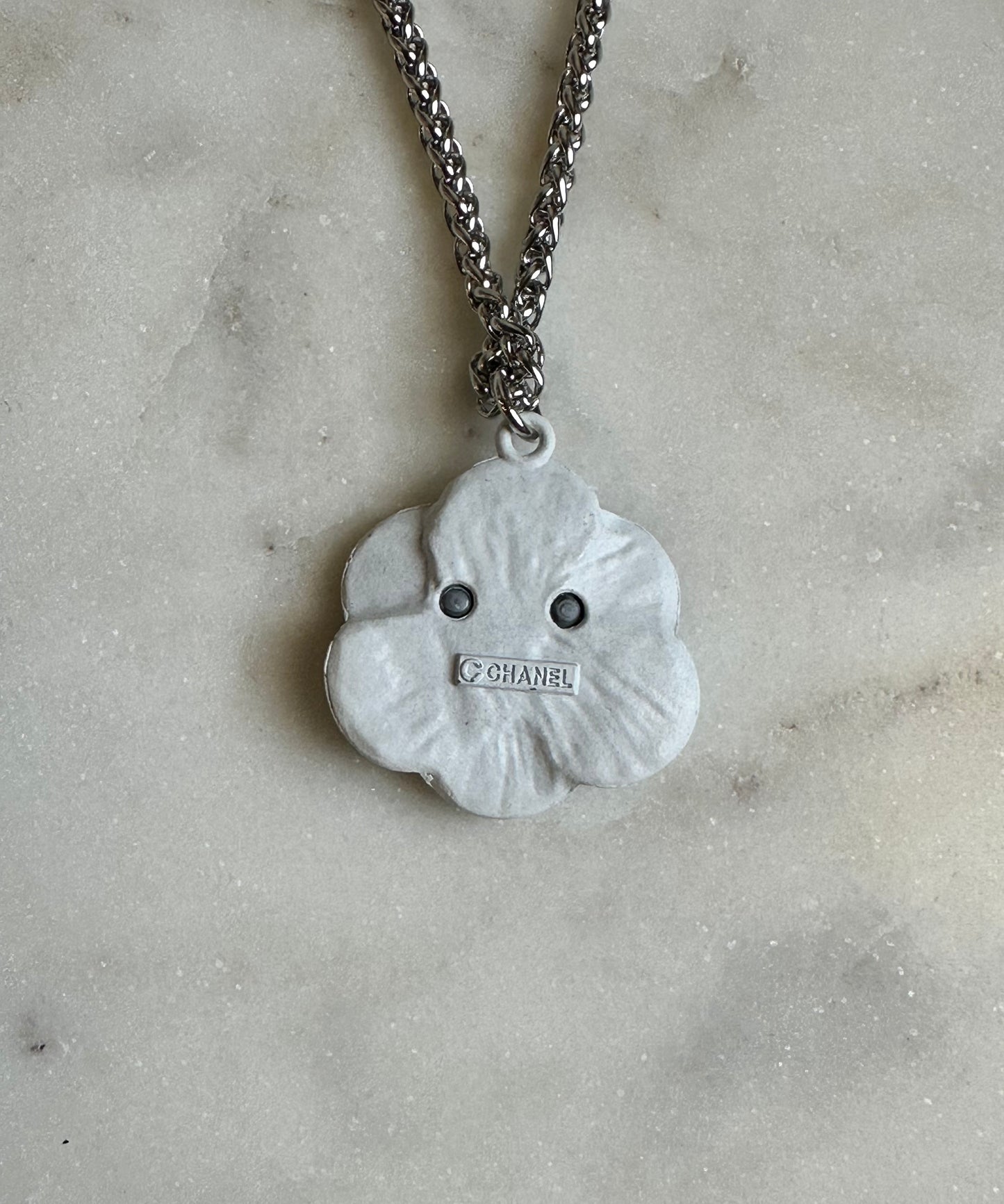 CC black and white camellia necklace