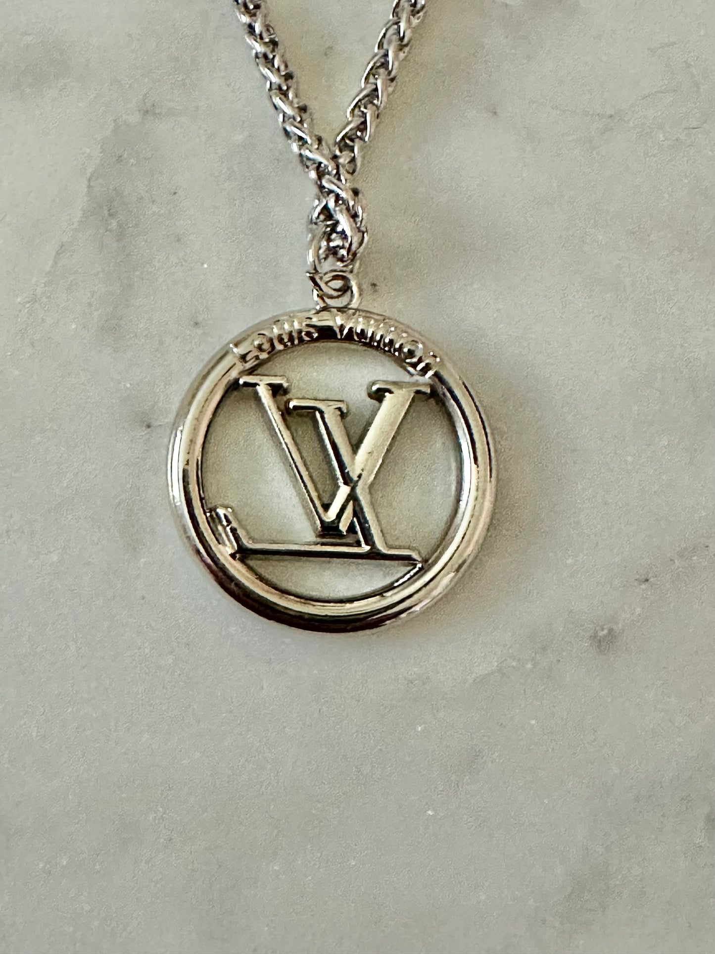 LV medallion necklace