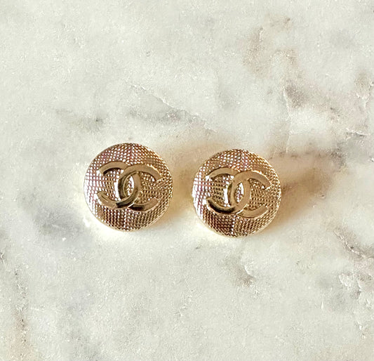 CC gold button earrings