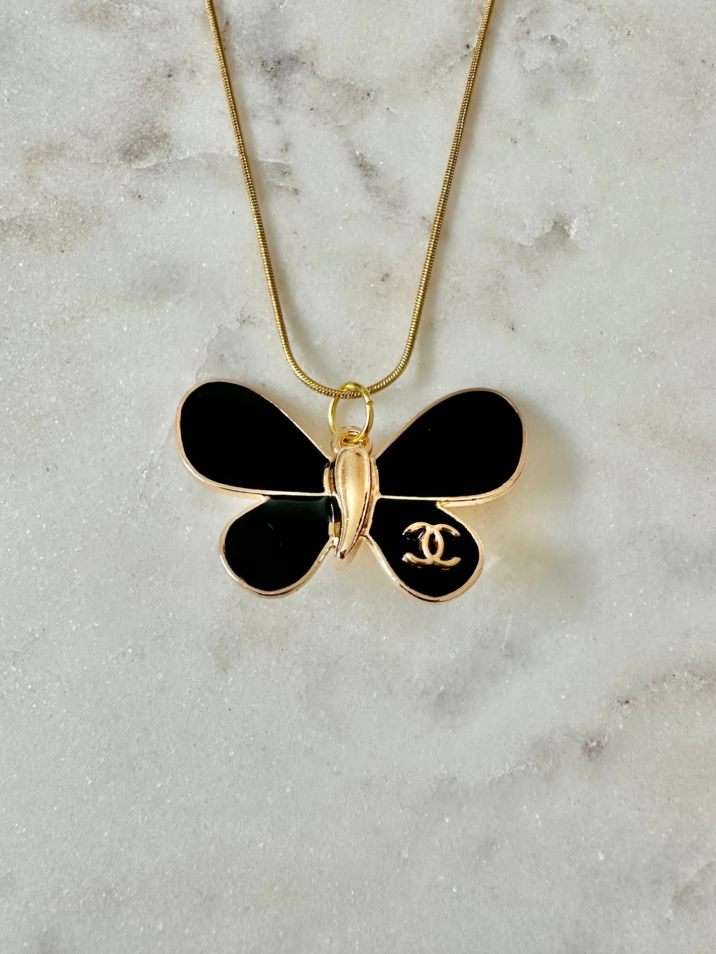 CC black butterfly necklace