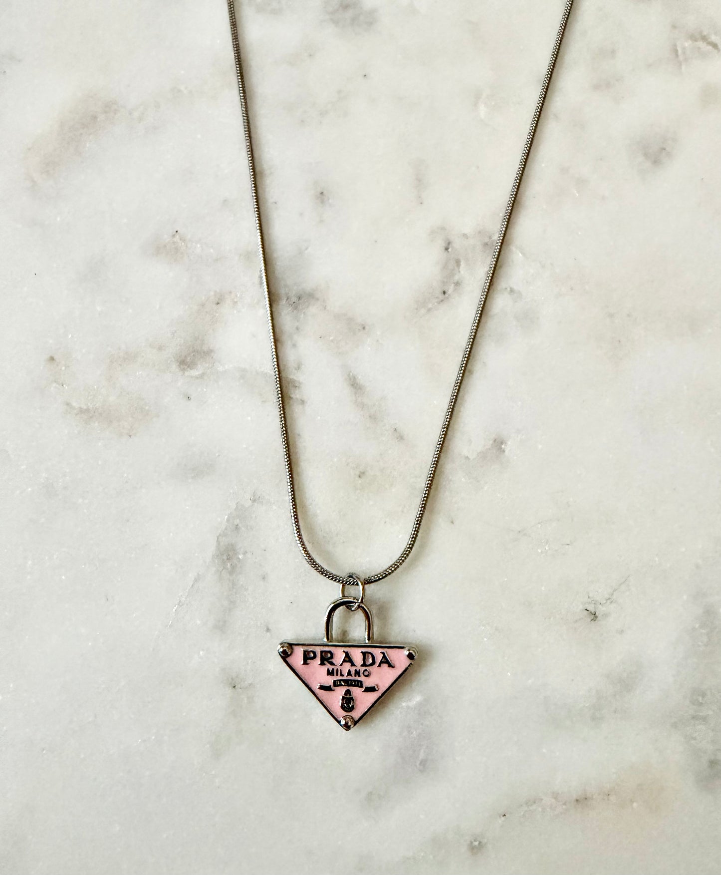 Prada pink silver tone necklace