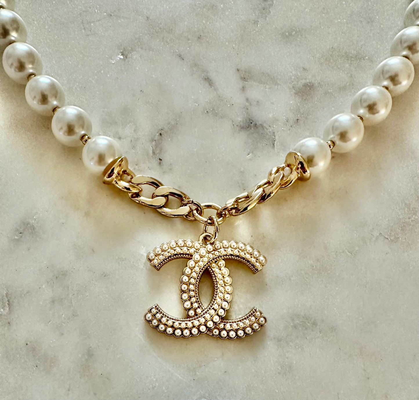 CC white pearl necklace