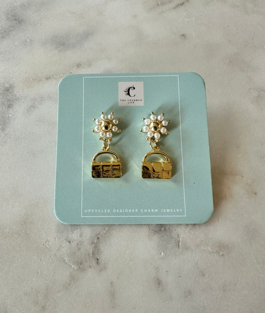 Fendi bag with faux pearl earrings