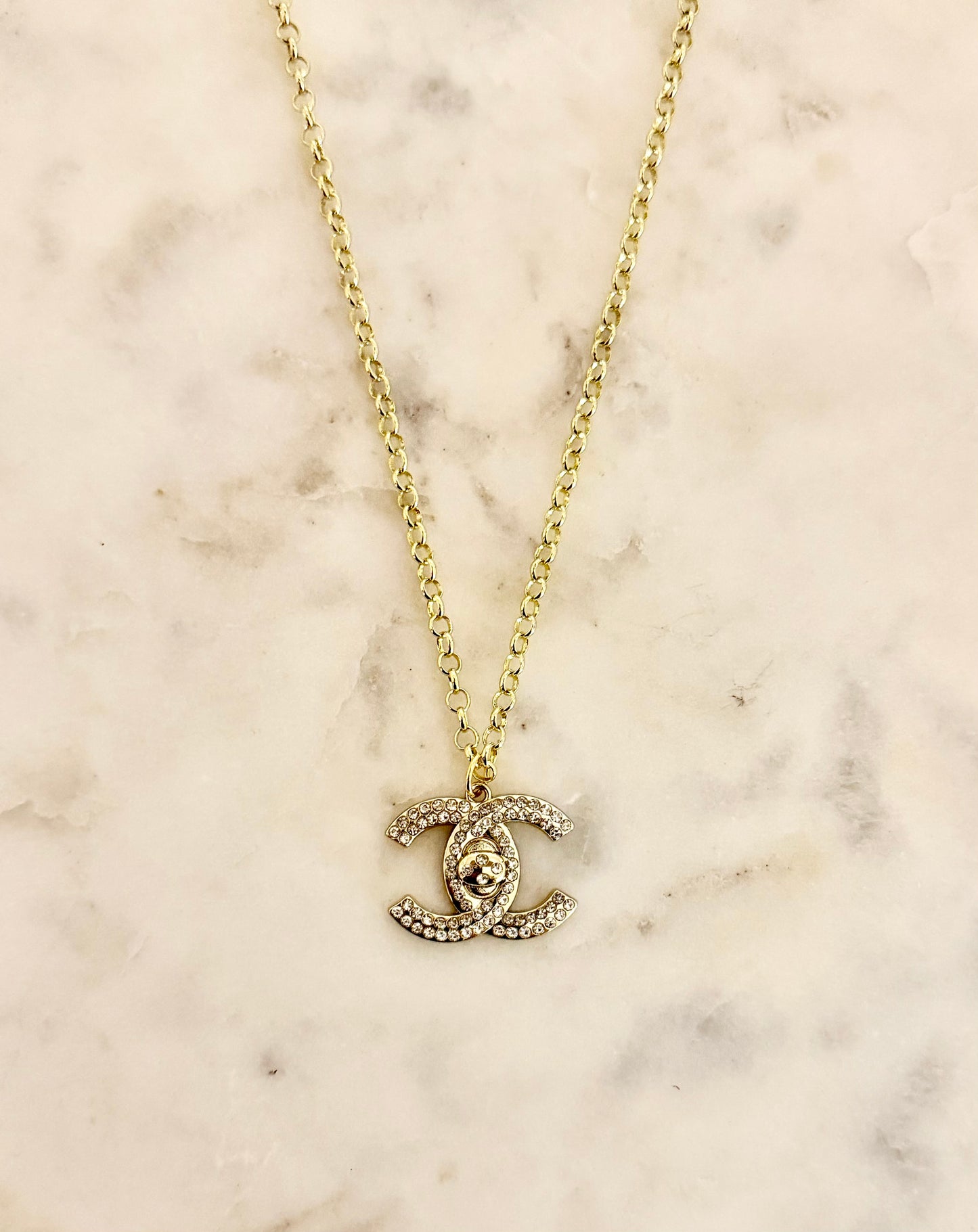 CC Turnlock rhinestone necklace