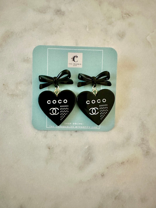 CC black resin heart earrings