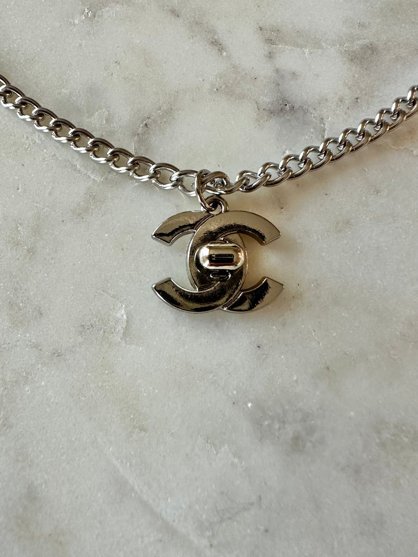 CC silver turn lock necklace 16”