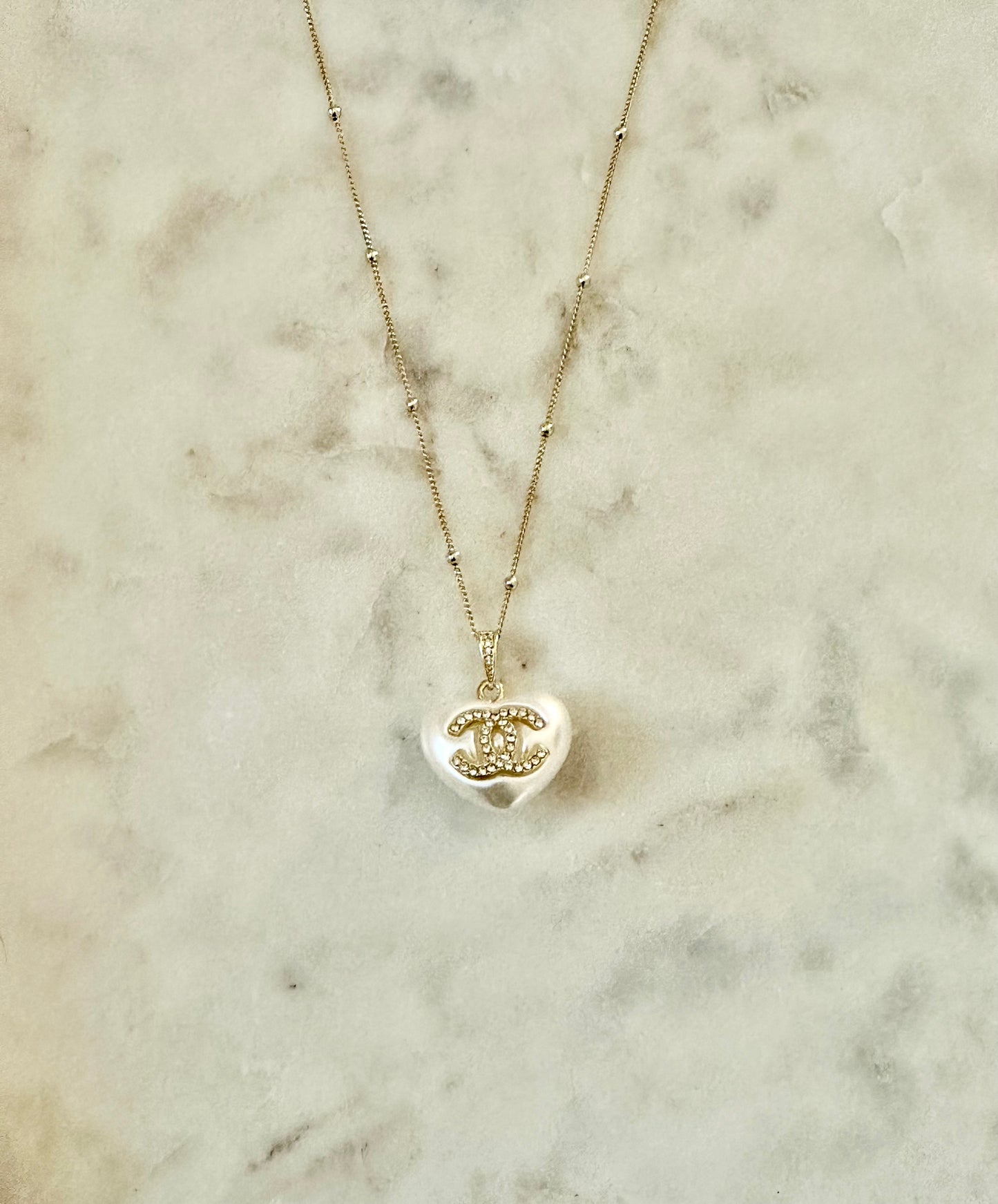 CC faux pearl heart necklace