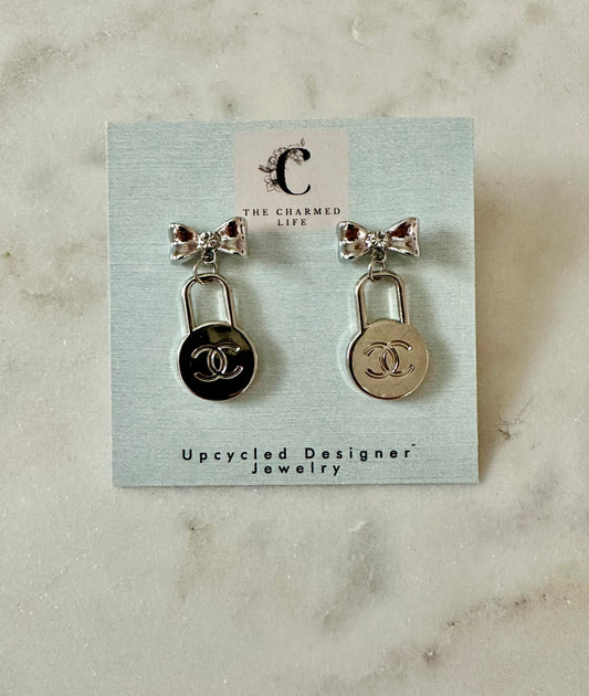 CC circle and bow earrings