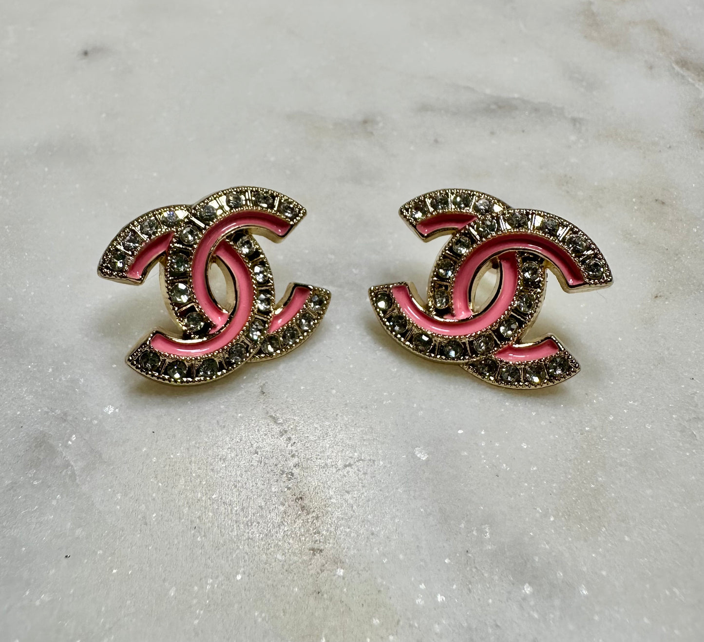 CC pink button earrings