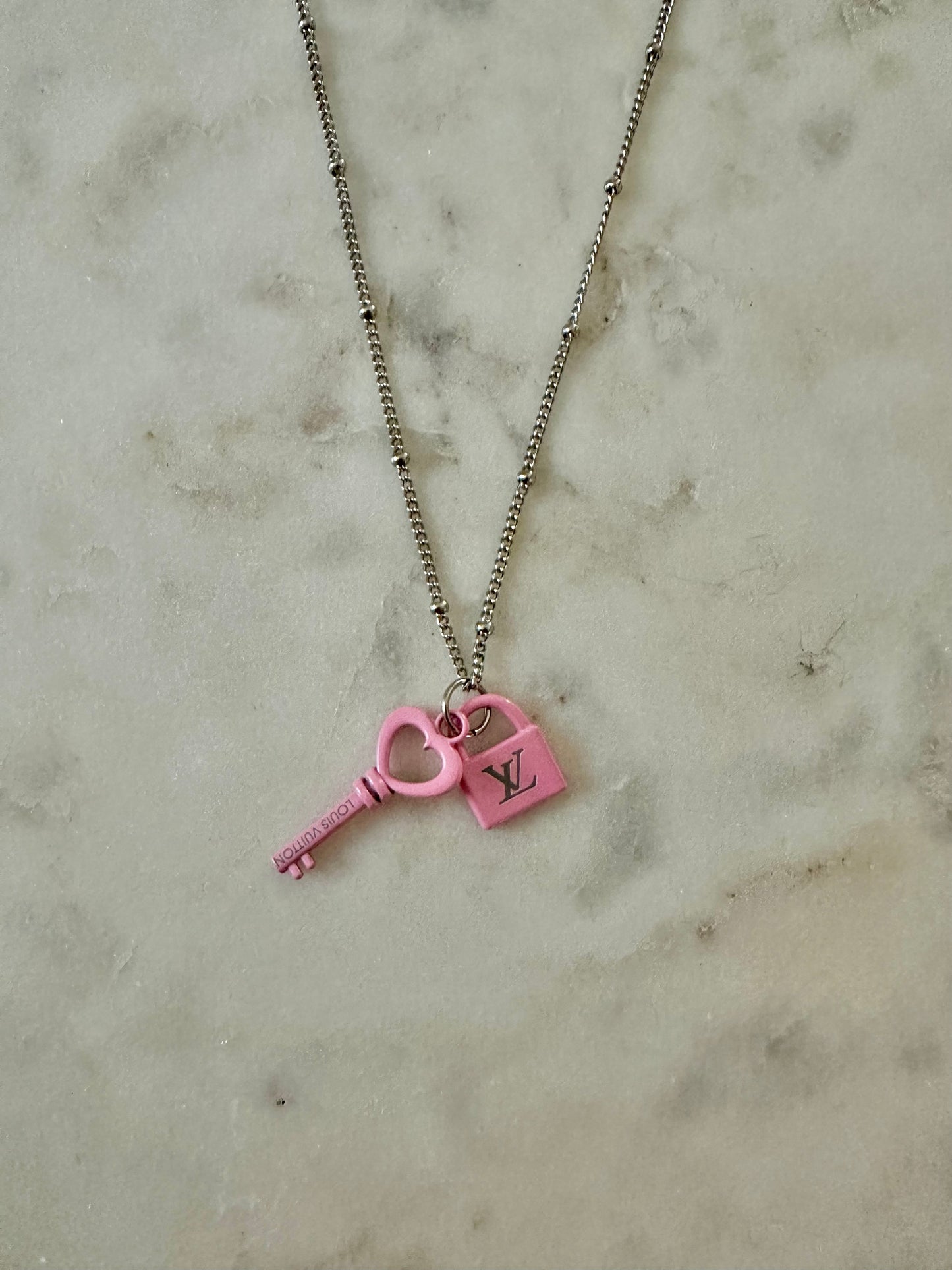 LV pink lock and key necklace
