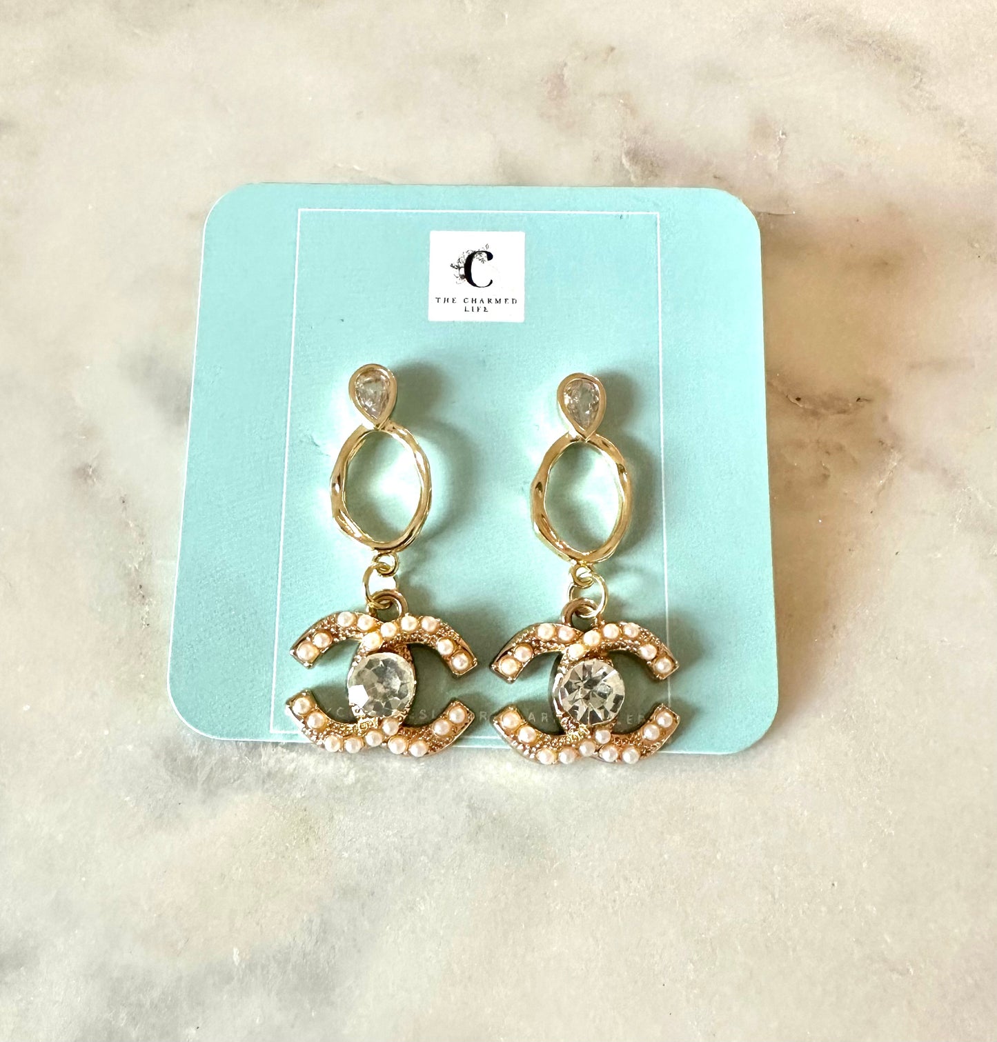CC pearl and rhinestone pendant earrings