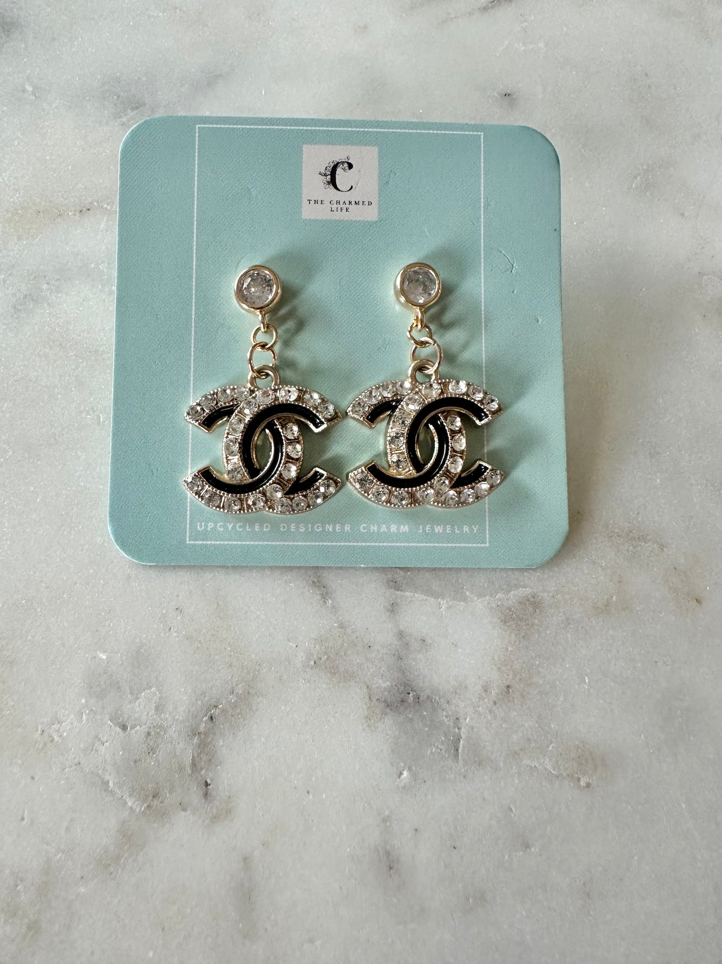 CC black and rhinestone pendant earrings