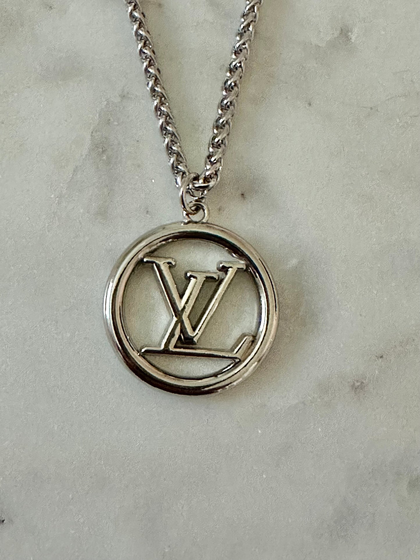 LV medallion necklace
