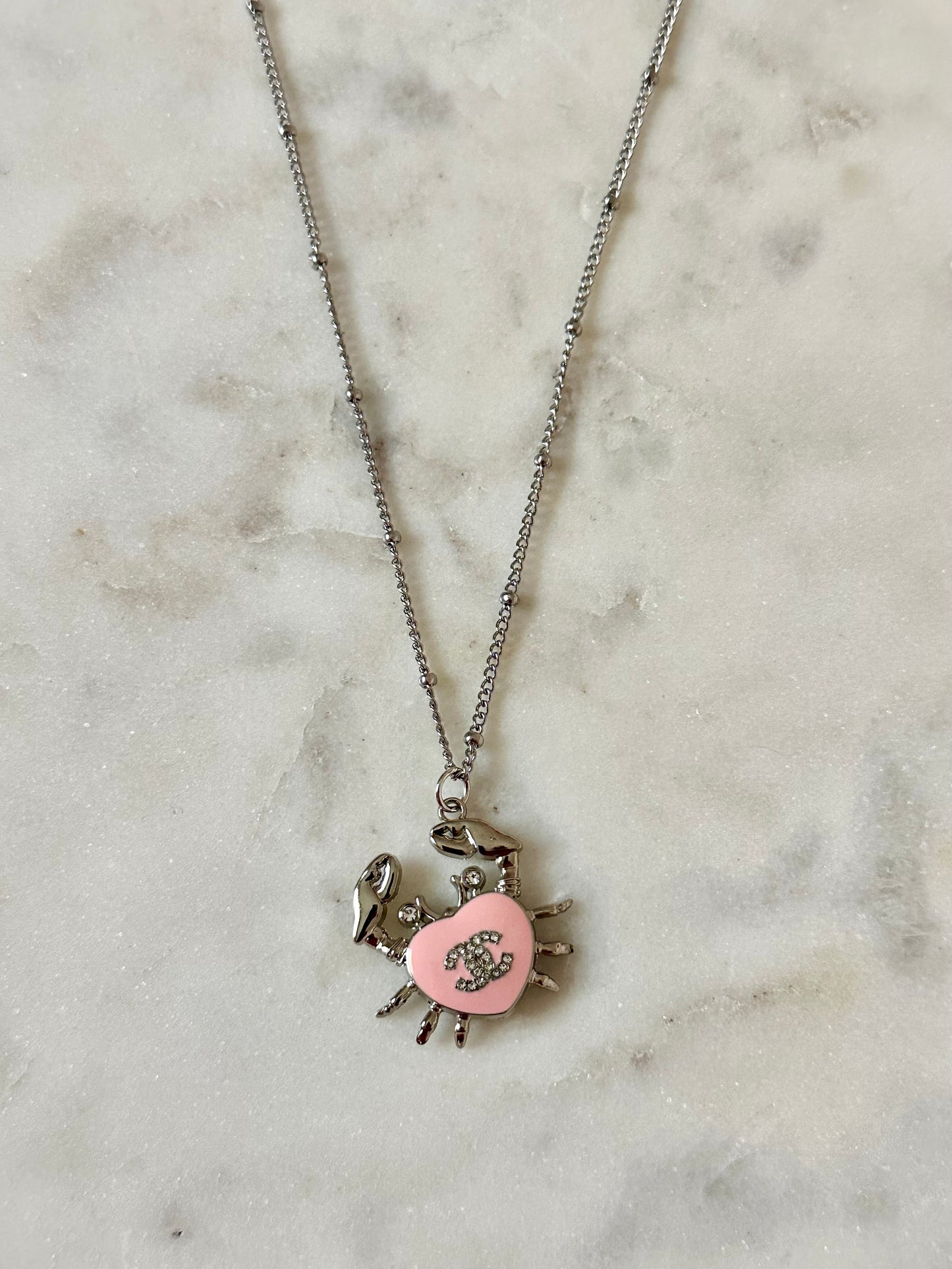 CC pink crab necklace