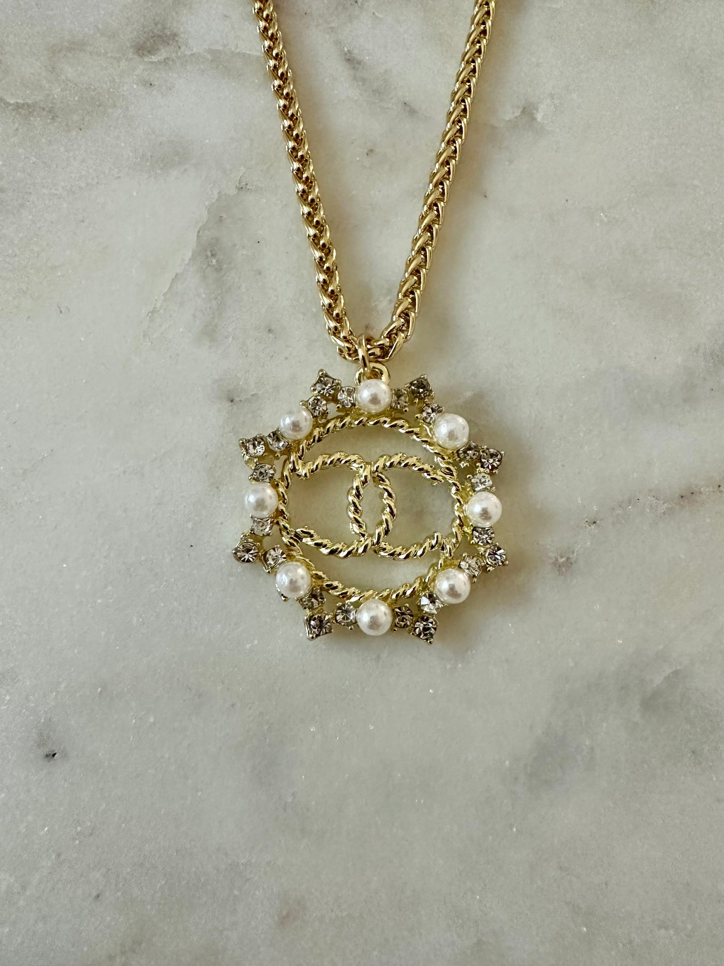 CC round pendant with rhinestone/faux pearl accent necklace