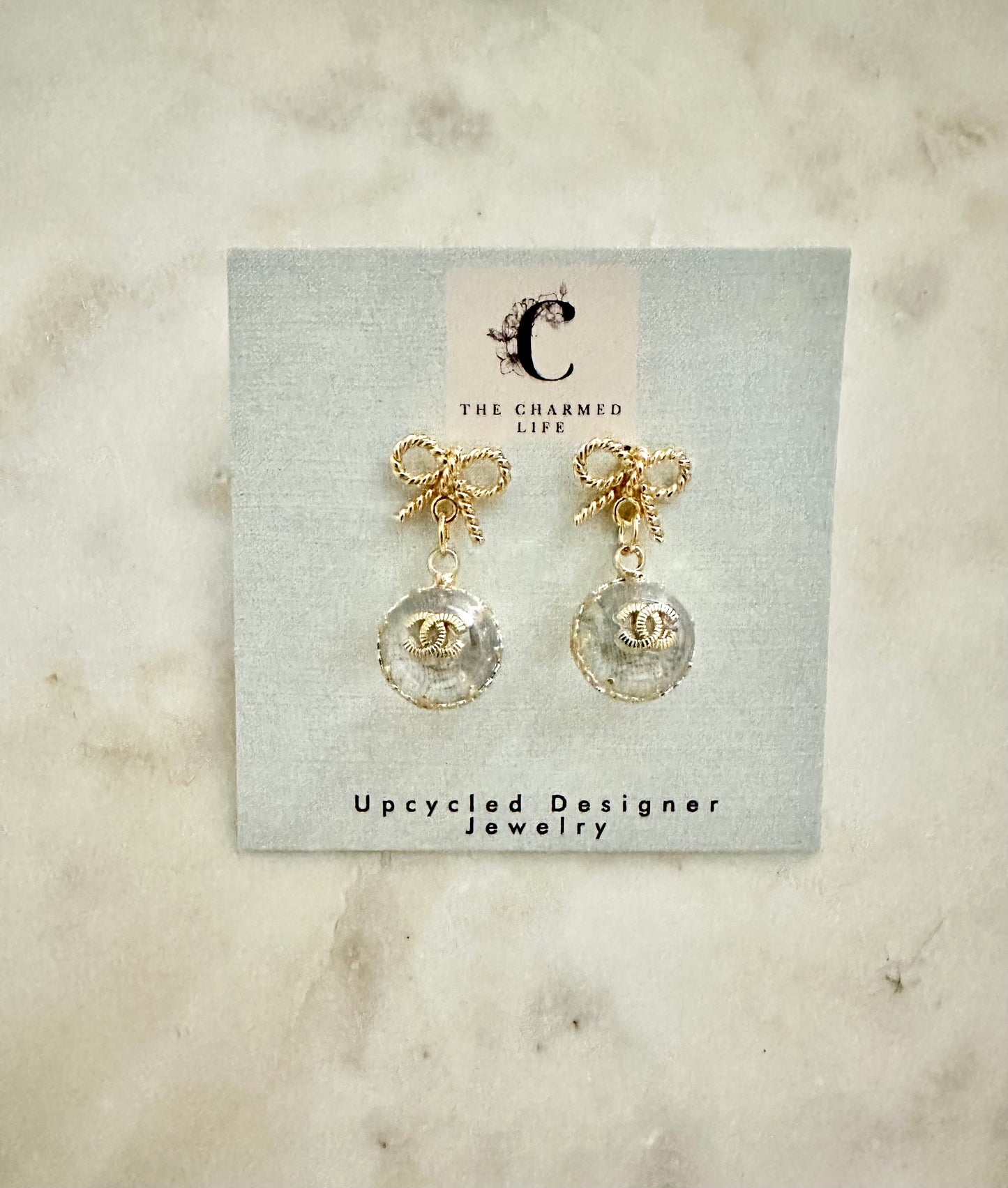 CC clear ball with bow earrings