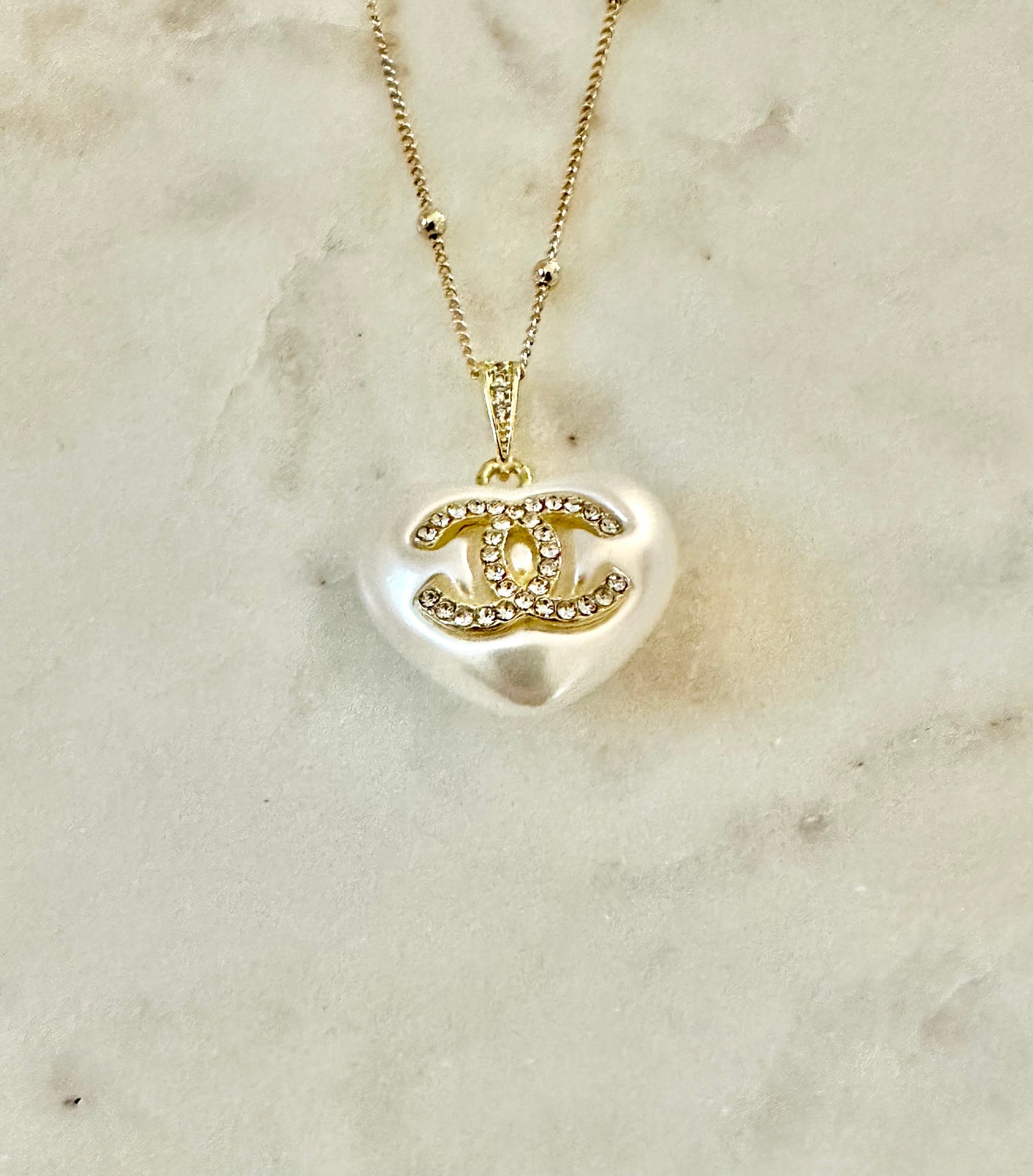 CC faux pearl heart necklace