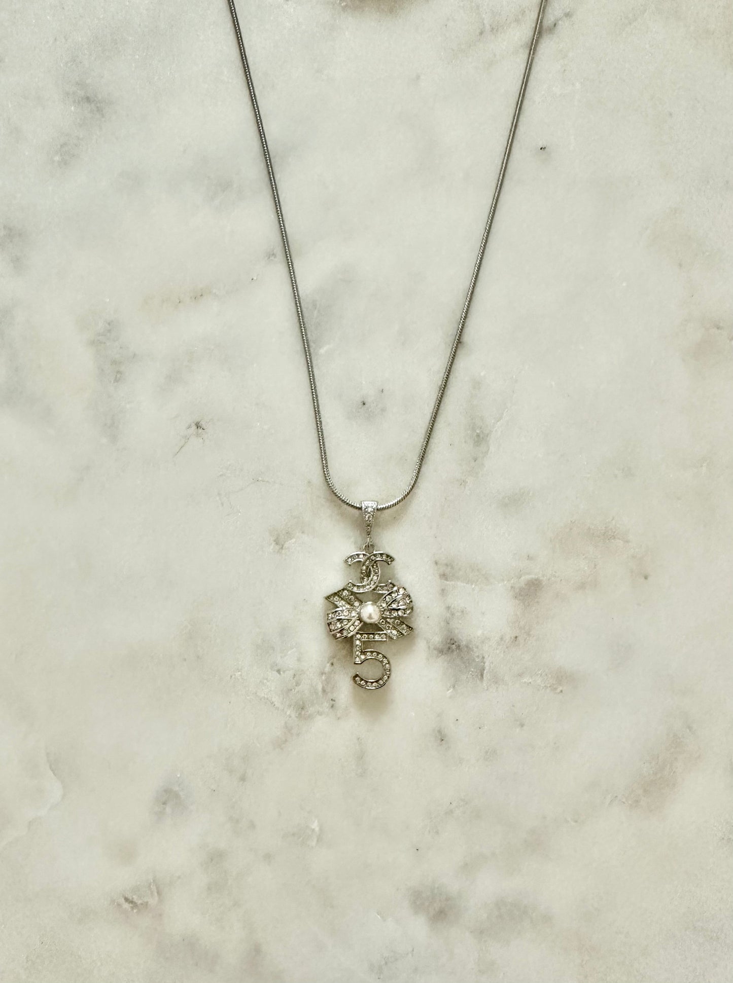 Chanel #5 rhinestone and faux pearl necklace