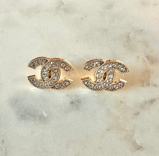 CC rhinestone and gold tone button earrings