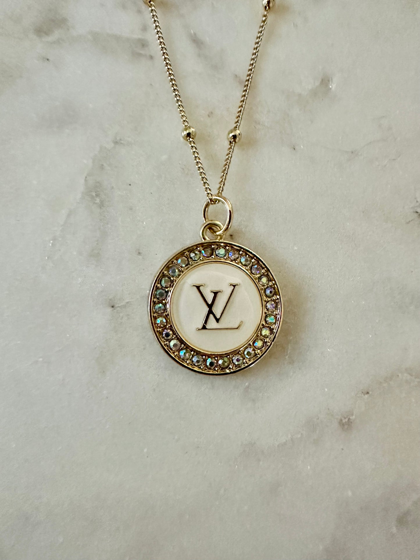 LV iridescent medallion necklace