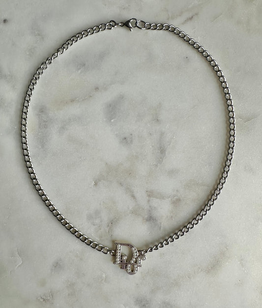 Dior with faux pearl necklace