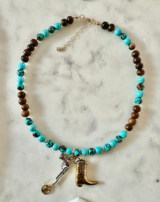 LV boots and gun beaded necklace gold tone