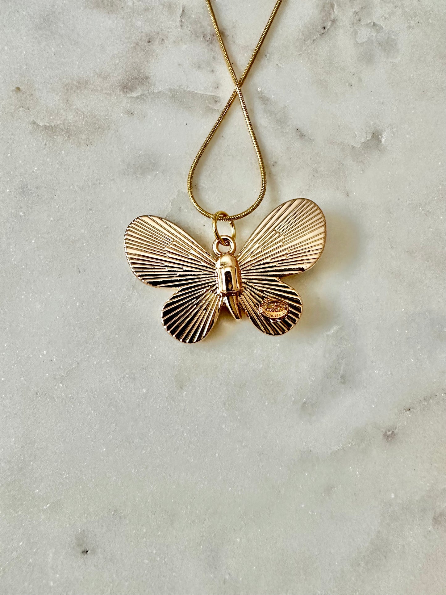 CC black butterfly necklace