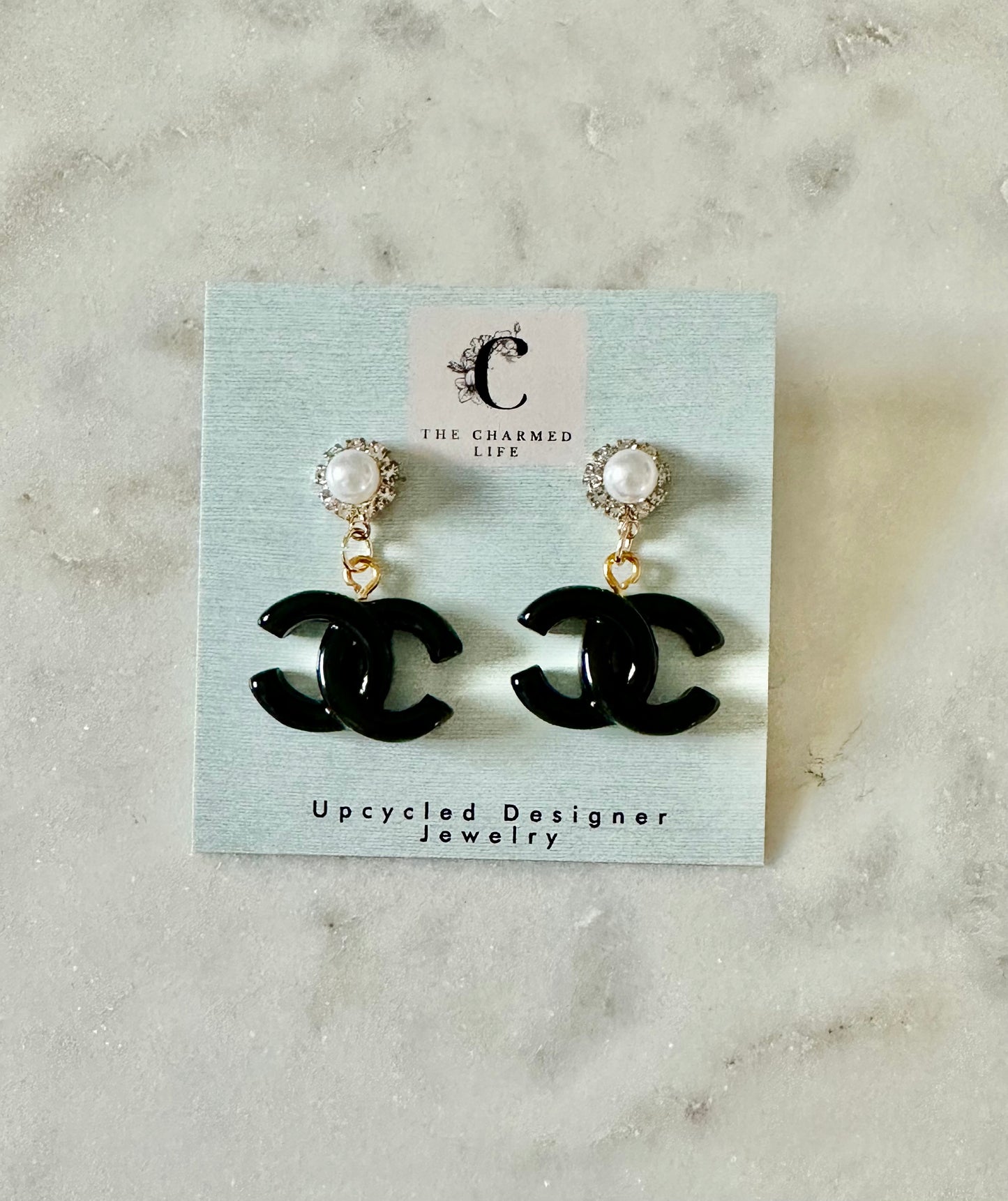 CC black resin faux pearl earrings